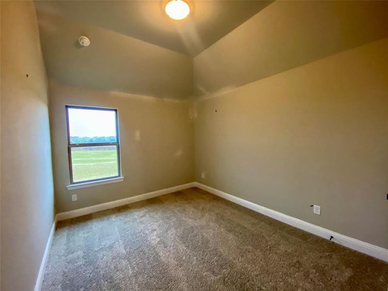 Bed 3 with vaulted ceiling.