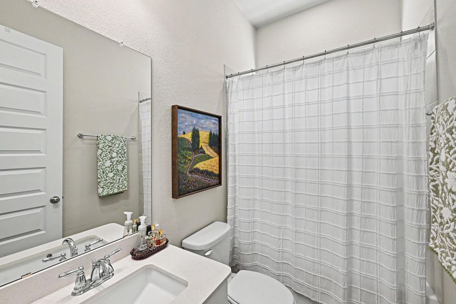 The second-floor full bathroom features a tub/shower combination and is located next to the third bedroom. The second-floor full bathroom features a tub/shower combination and is located next to the third bedroom.