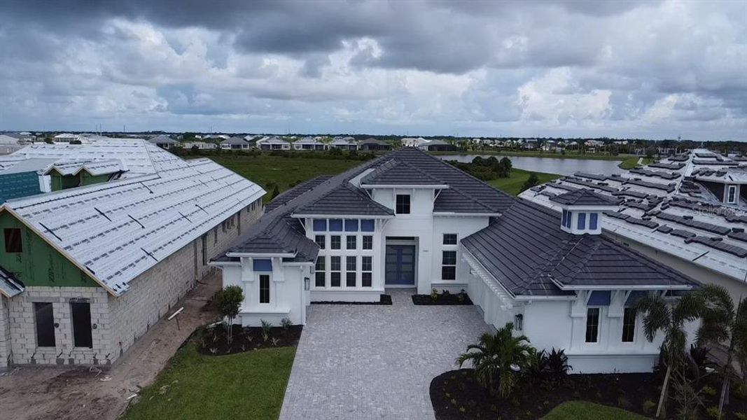 Front exterior of a new home in , Venice, FL, highlighting curb appeal (Image 2). Front exterior of a new home in , Venice, FL, highlighting curb appeal (Image 2).