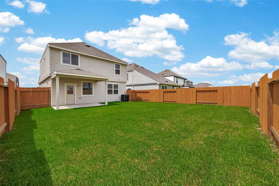 Exterior details and patio area of a home in Wayside Village, Houston (Image 4).
