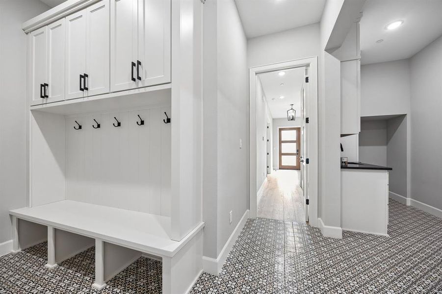 Mudroom featuring baseboards and recessed lighting Mudroom featuring baseboards and recessed lighting