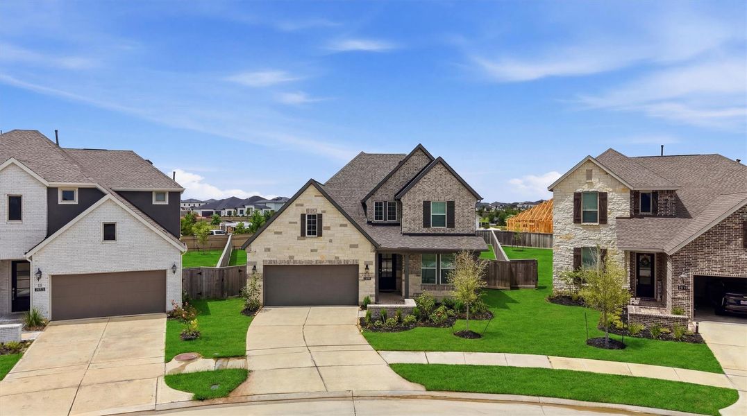 Front exterior of a new home in , Cypress, TX, highlighting curb appeal (Image 26).