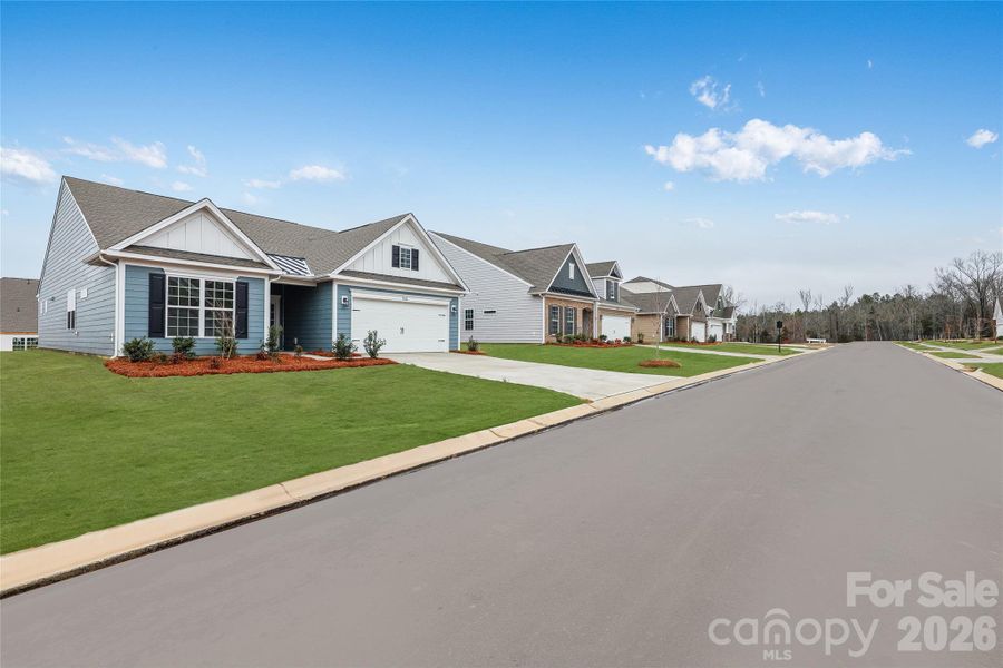 Front exterior of a new home in Roselyn, Lancaster, SC, highlighting curb appeal (Image 18). Front exterior of a new home in Roselyn, Lancaster, SC, highlighting curb appeal (Image 18).