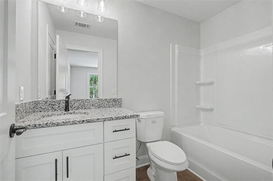 Furnished interior view inside a new home in , Dallas (Image 12).
