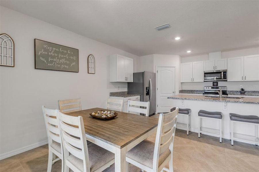 Furnished interior view inside a new home in Groveside at Ormond Station, Ormond Beach (Image 9).