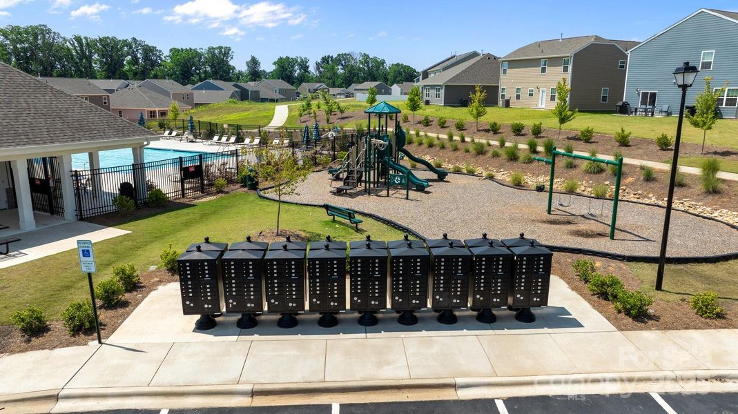Front exterior of a new home in Secrest Commons, Monroe, NC, highlighting curb appeal (Image 22).