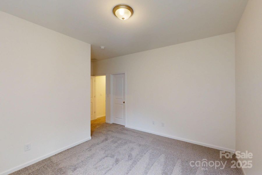 Upper level secondary bedroom Upper level secondary bedroom