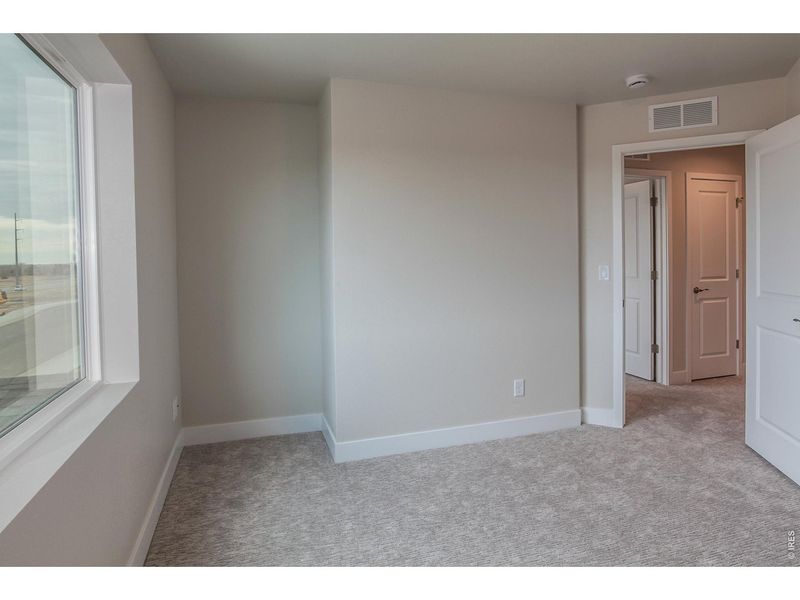 Spacious, unfurnished interior of a new home in Wilson Commons, Loveland (Image 22).
