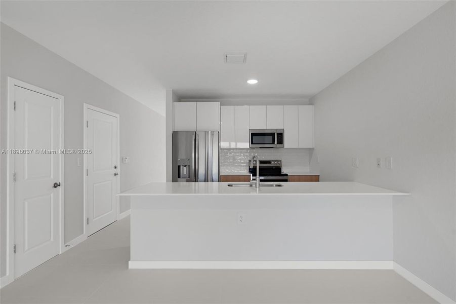 Furnished interior view inside a new home in , Miami (Image 7). Furnished interior view inside a new home in , Miami (Image 7).