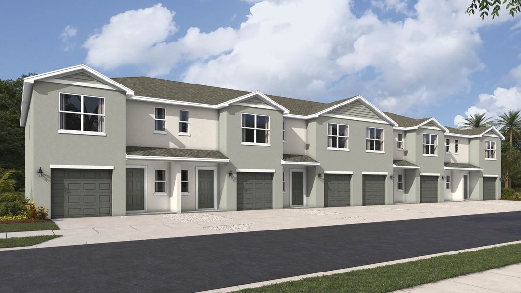 Front exterior of a new home in Townes at Island Lake, Pinellas Park, FL, highlighting curb appeal (Image 17).