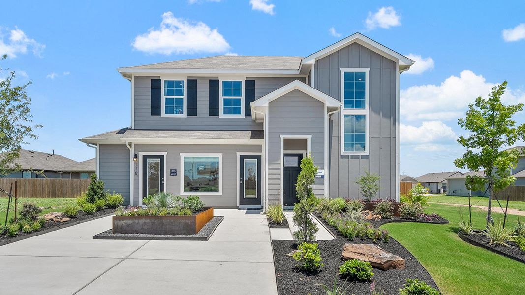Front exterior of a new home in Talavera, Kyle, TX, highlighting curb appeal (Image 20). Front exterior of a new home in Talavera, Kyle, TX, highlighting curb appeal (Image 20).