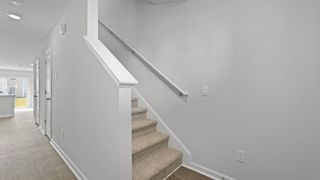 Furnished interior view inside a new home in Pine Hills Townhomes at Cane Bay, Summerville (Image 8).