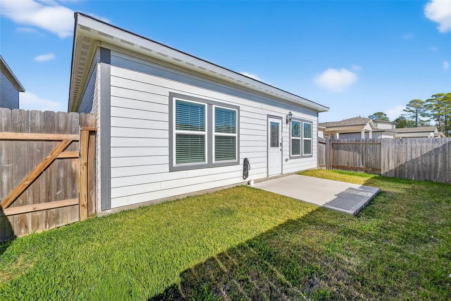 Exterior details and patio area of a home in , Magnolia (Image 24). Exterior details and patio area of a home in , Magnolia (Image 24).