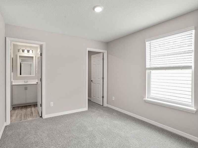 Bedrooms 2 and 3 share a Jack-and-Jill bath - Donatella bungalow by Highland Homes