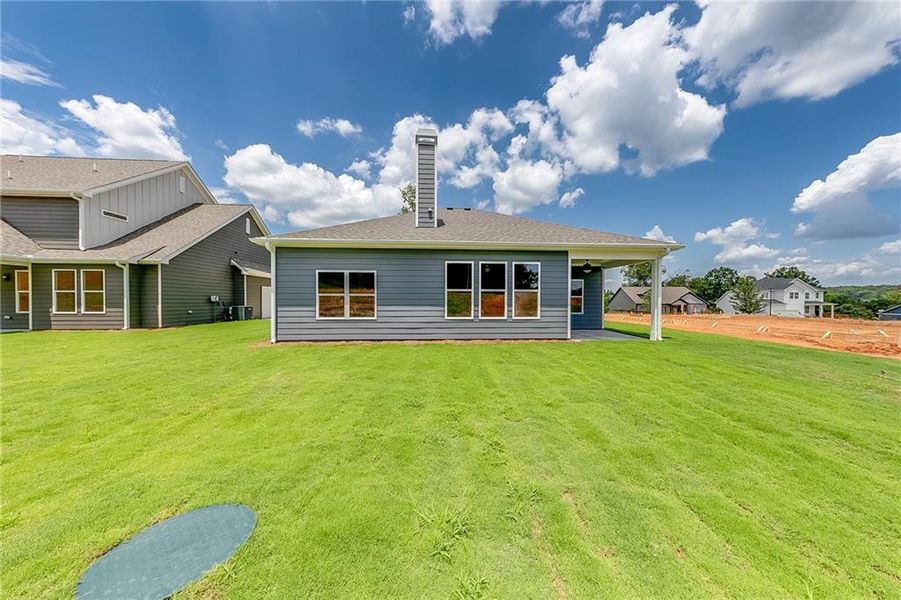Front exterior of a new home in , Homer, GA, highlighting curb appeal (Image 8).