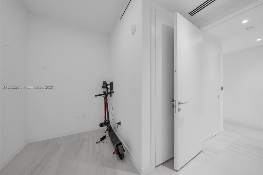 Furnished interior view inside a new home in Aston Martin Residences, Miami (Image 39).