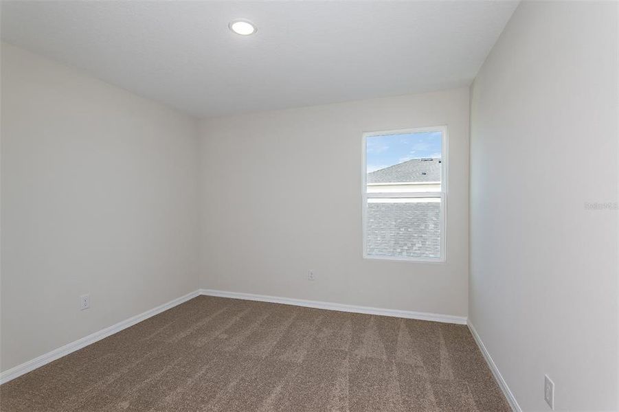 Spacious, unfurnished interior of a new home in Scenic Terrace, Haines City (Image 45).