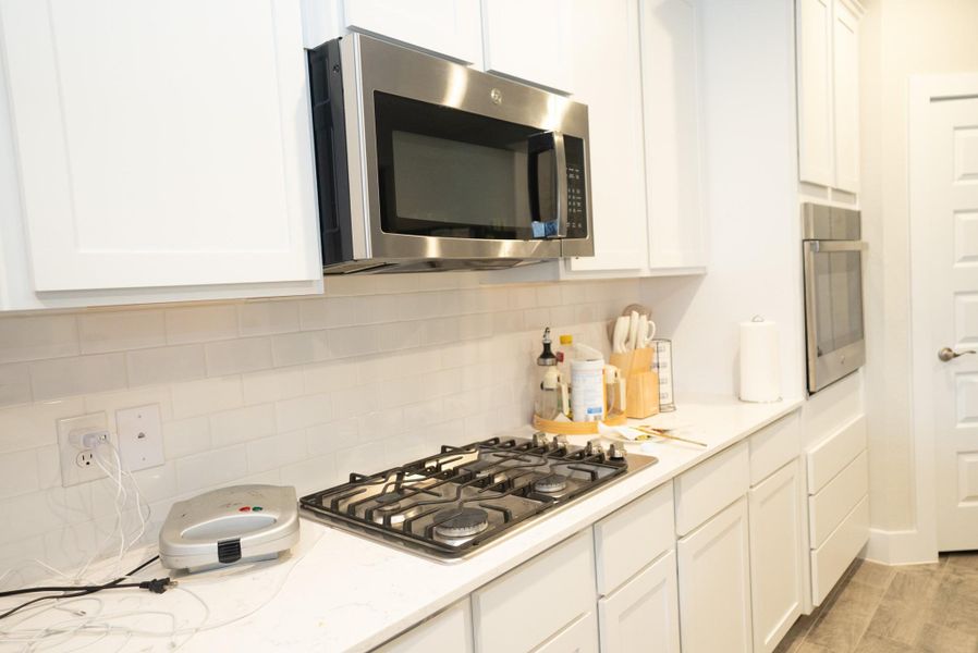 Close-up of interior finishes inside a home in Sunterra, Katy (Image 22).