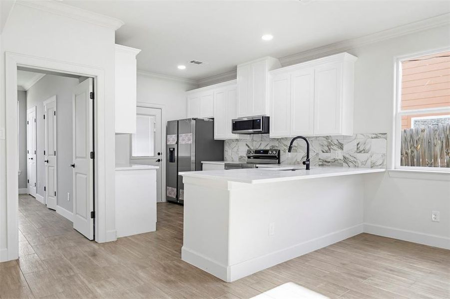 Furnished interior view inside a new home in , Fort Worth (Image 8).