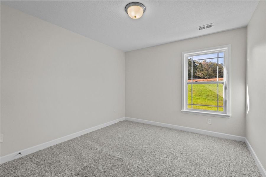 Representative unfurnished interior of a home built from the Morgan by Enchanted Homes in Lonesome Dove, San Antonio (Image 27).