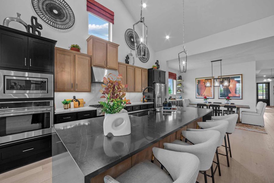 Representative furnished interior of a home built from the The Caroline by David Weekley Homes in South Pointe Manor Series, Mansfield (Image 4).