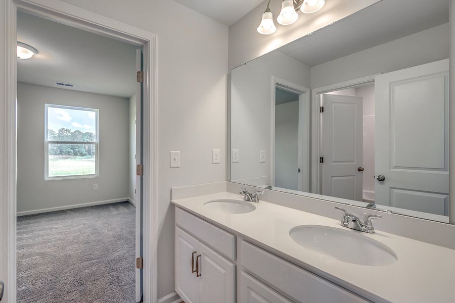 Furnished interior view inside a new home in Six Oaks, Summerville (Image 7).
