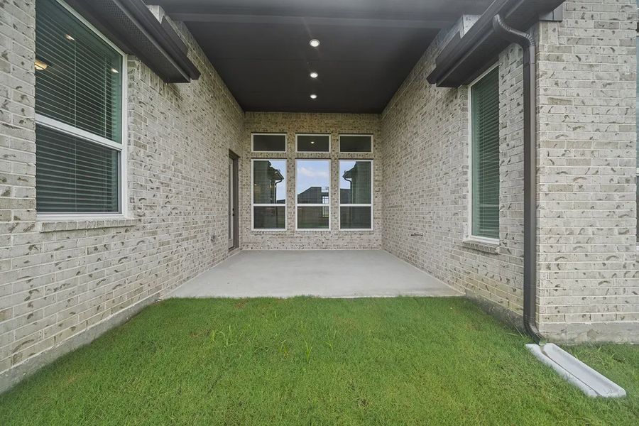 Representative exterior details of a home built from the Summerton by Chesmar Homes in University Heights, Round Rock (Image 4).