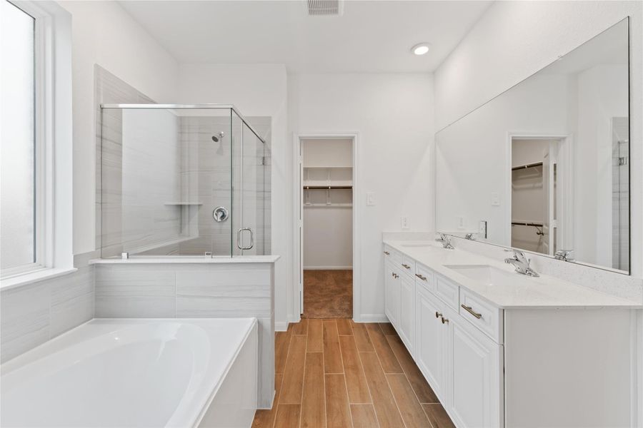 Furnished interior view inside a new home in Sunterra, Katy (Image 5).