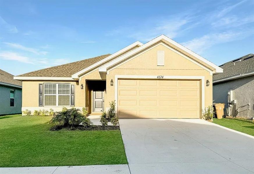 Front exterior of a new home in Harmony Central, Harmony, FL, highlighting curb appeal (Image 1). Front exterior of a new home in Harmony Central, Harmony, FL, highlighting curb appeal (Image 1).