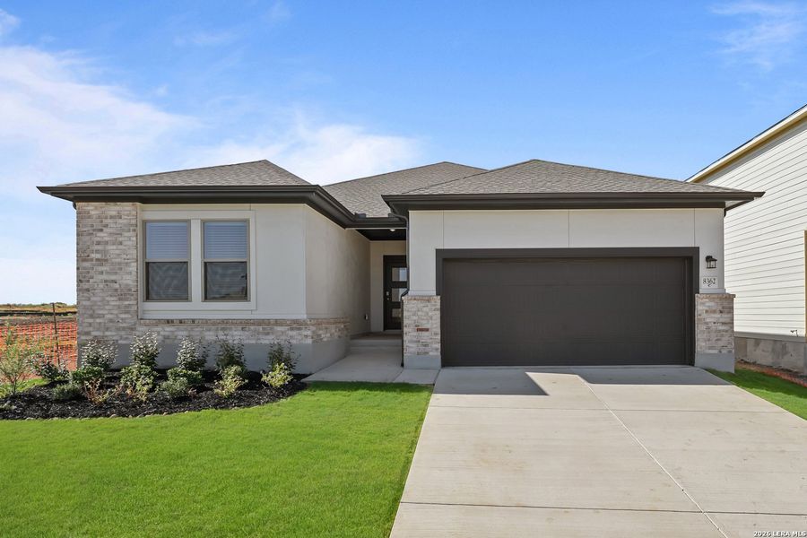 Front exterior of a new home in Garden Grove, San Antonio, TX, highlighting curb appeal (Image 2). Front exterior of a new home in Garden Grove, San Antonio, TX, highlighting curb appeal (Image 2).