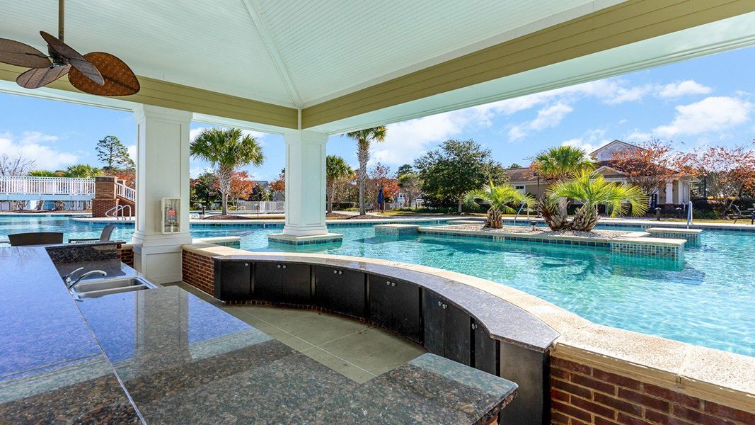 Exterior details and patio area of a home in Waterbridge, Myrtle Beach (Image 2).