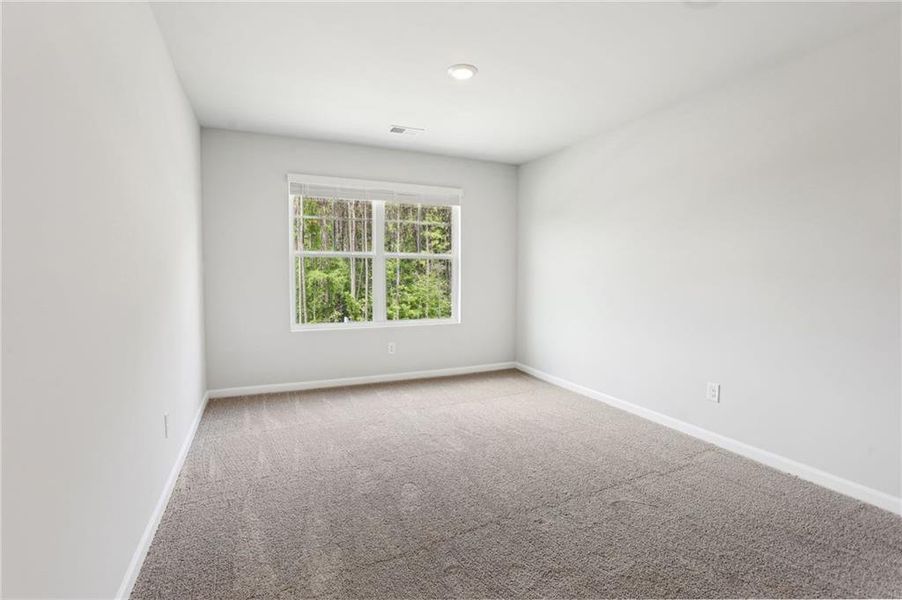 Spacious, unfurnished interior of a new home in The Hills at Cedar Creek, Winder (Image 21).