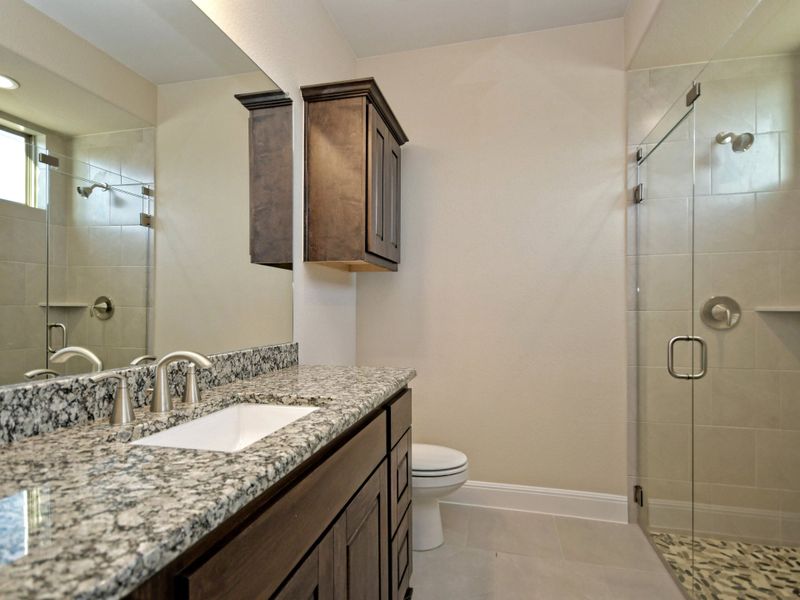 Representative furnished interior of a home built from the Santa Barbara II by Giddens Homes in Scofield Farms Estates, Georgetown (Image 63).