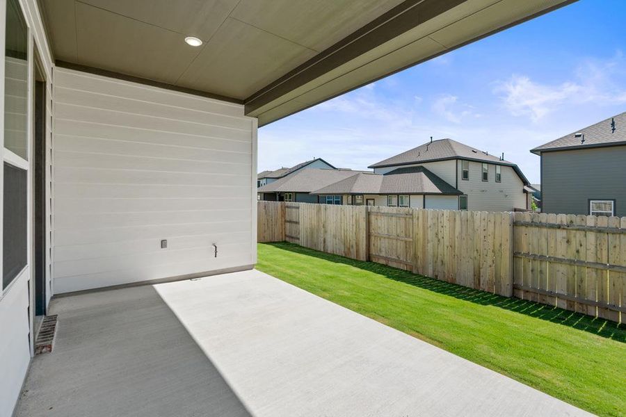 Front exterior of a new home in Arbor Collection at Lariat, Liberty Hill, TX, highlighting curb appeal (Image 20). Front exterior of a new home in Arbor Collection at Lariat, Liberty Hill, TX, highlighting curb appeal (Image 20).
