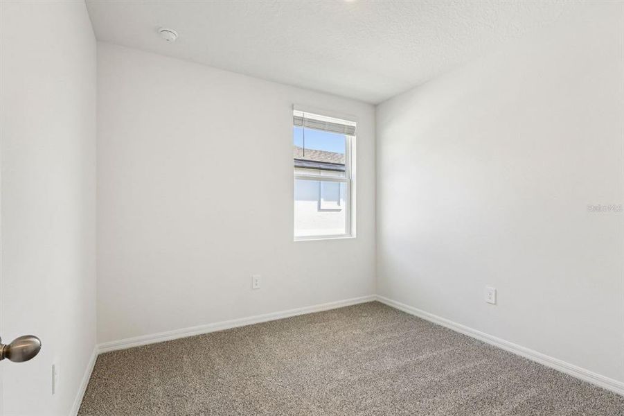 Spacious, unfurnished interior of a new home in Springs at Lake Alfred - Classic Series, Lake Alfred (Image 23).