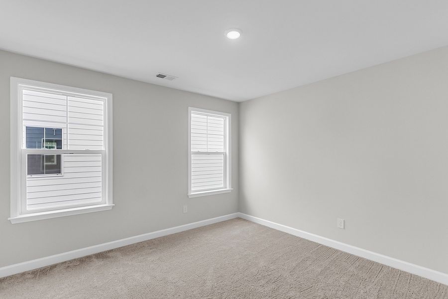 Spacious, unfurnished interior of a new home in Pineland Preserve, Summerville (Image 40).