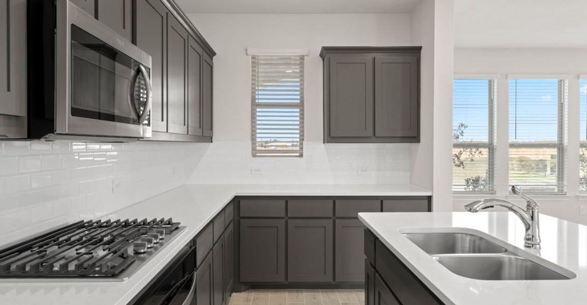 Representative exterior photo of a completed home built from the Caddo by Impression Homes in Creekshaw, Royse City, TX (Image 7).