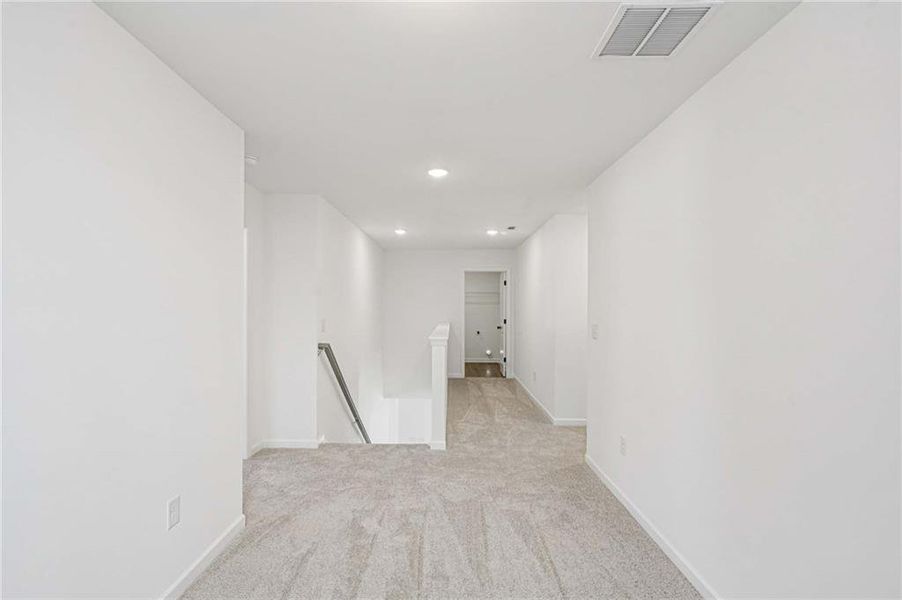 Spacious, unfurnished interior of a new home in Eastlyn Crossing - Single Family, Flowery Branch (Image 16). Spacious, unfurnished interior of a new home in Eastlyn Crossing - Single Family, Flowery Branch (Image 16).