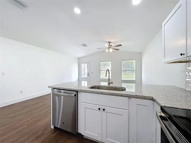 Furnished interior view inside a new home in , Weeki Wachee (Image 9).