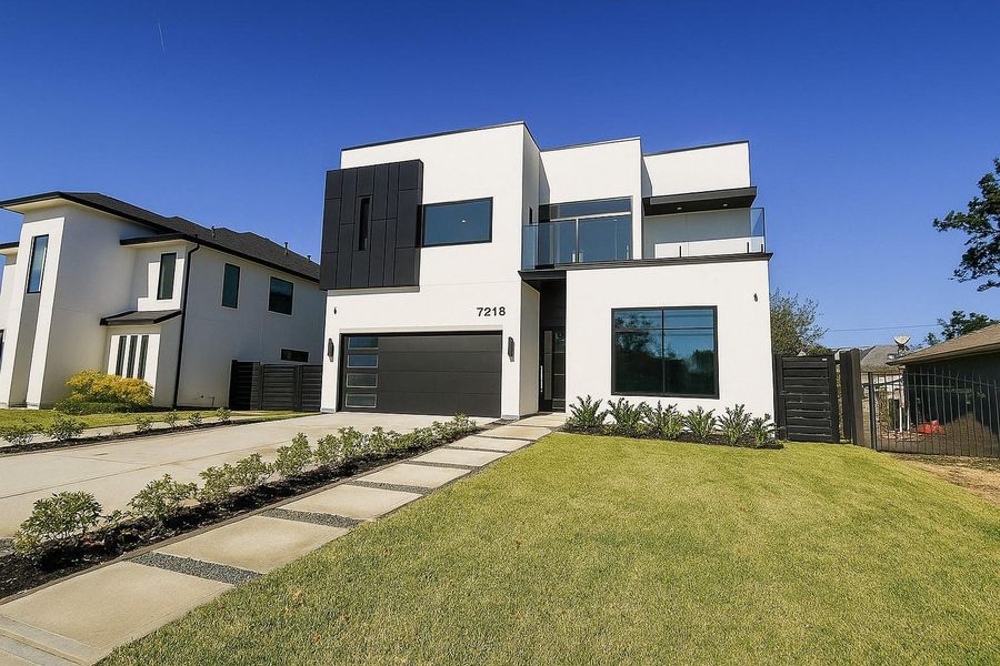Front exterior of a new home in , Houston, TX, highlighting curb appeal (Image 23).