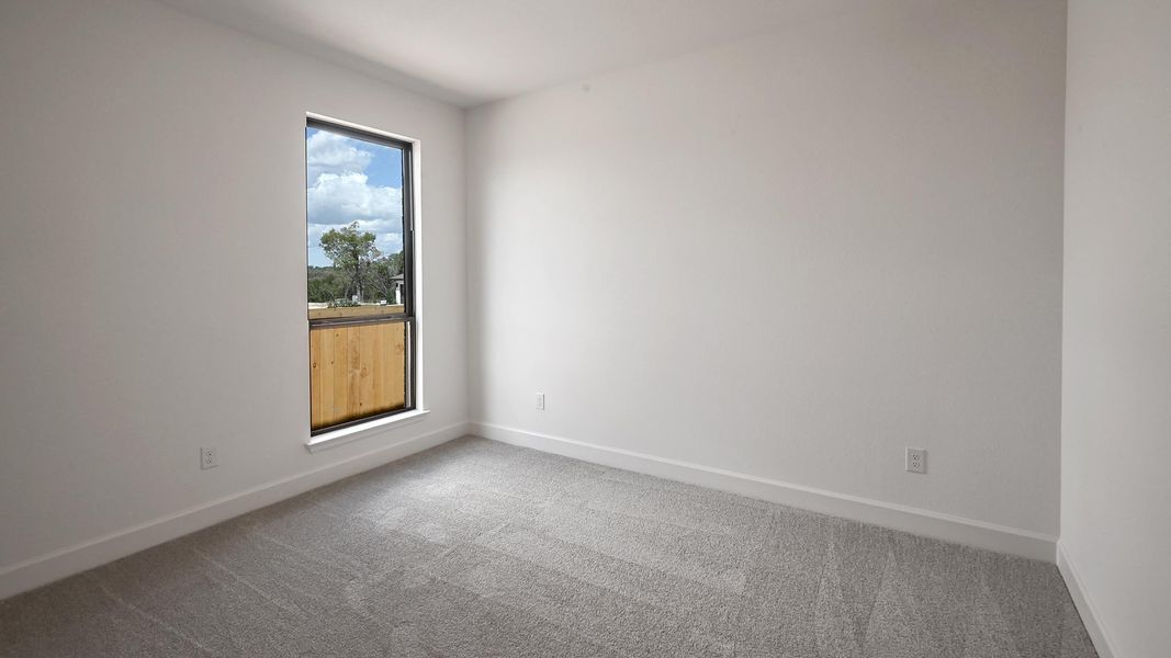 Spacious, unfurnished interior of a new home in 6 Creeks 45', Kyle (Image 20).