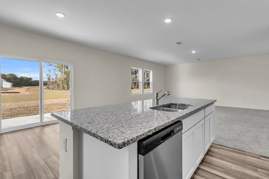 Representative furnished interior of a home built from the Supernova by Starlight Homes in Liberte, Converse (Image 12).