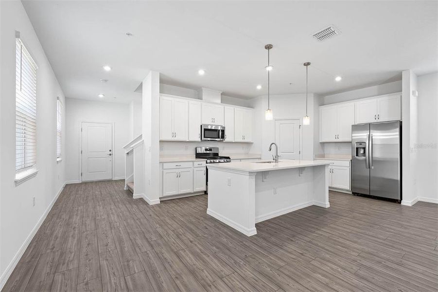 Furnished interior view inside a new home in Brack Ranch, St. Cloud (Image 4).
