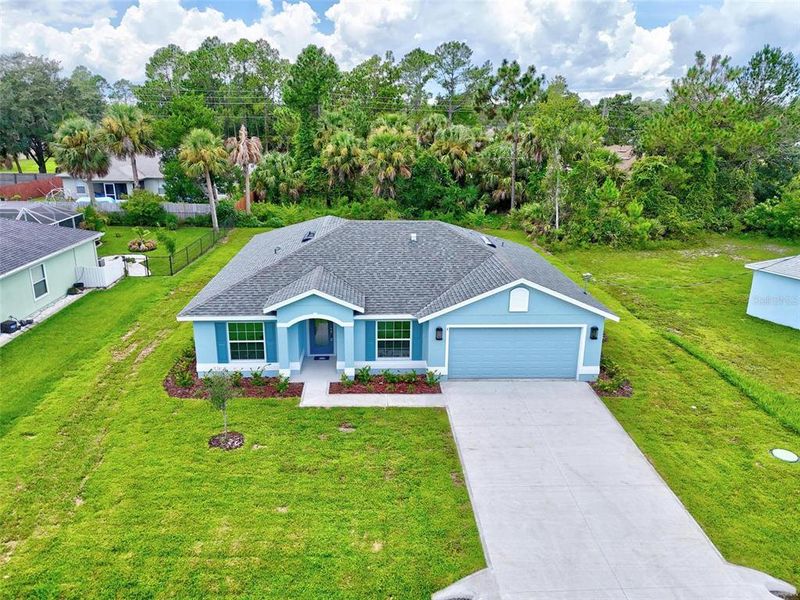 Front exterior of a new home in , Palm Coast, FL, highlighting curb appeal (Image 40).