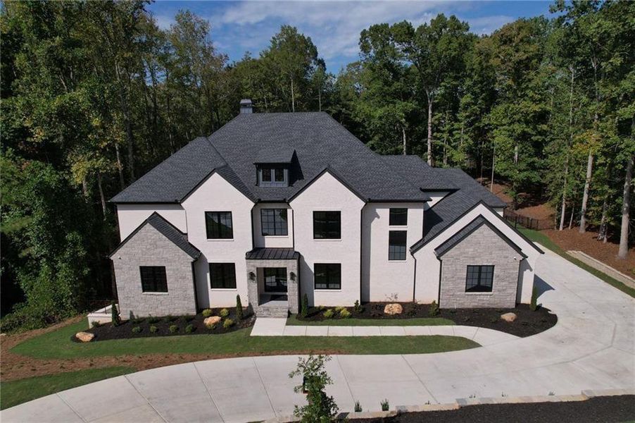 Front exterior of a new home in , Alpharetta, GA, highlighting curb appeal (Image 36).