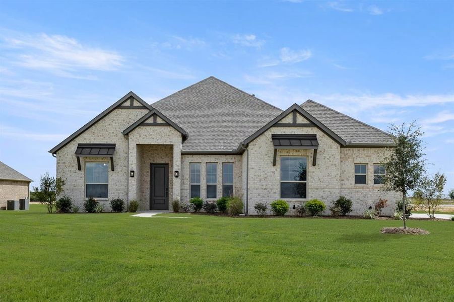 Front exterior of a new home in Settler's Glen, New Fairview, TX, highlighting curb appeal (Image 2). Front exterior of a new home in Settler's Glen, New Fairview, TX, highlighting curb appeal (Image 2).