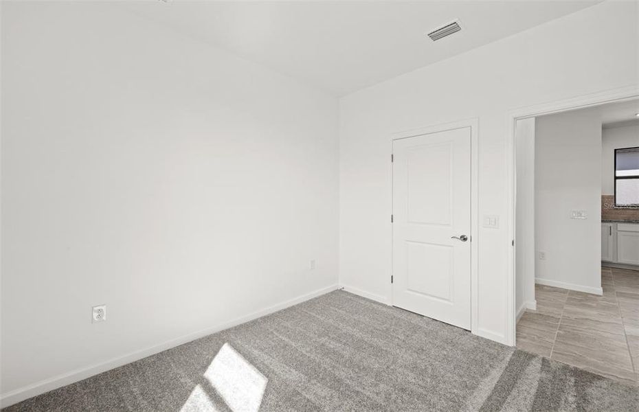 Spacious, unfurnished interior of a new home in Arbor Oaks, North Port (Image 14). Spacious, unfurnished interior of a new home in Arbor Oaks, North Port (Image 14).