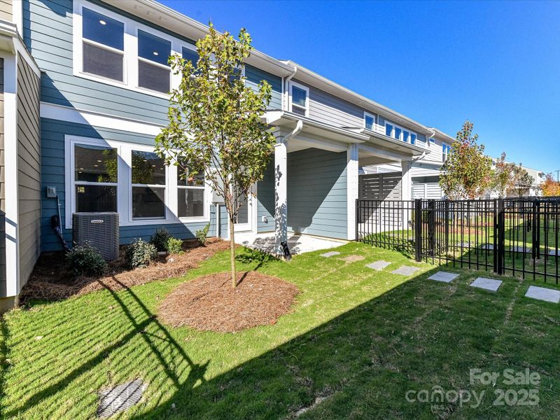 Exterior details and patio area of a home in North Creek Village, Huntersville (Image 22). Exterior details and patio area of a home in North Creek Village, Huntersville (Image 22).