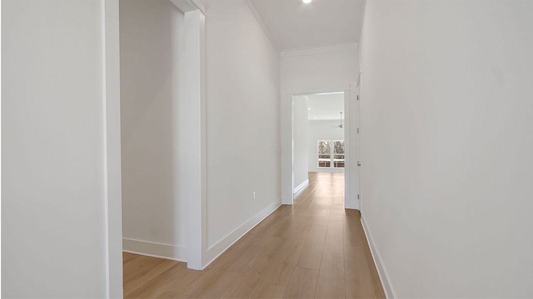 Representative unfurnished interior of a home built from the Magnolia by D.R. Horton in Breakfast Point East Phase II, Panama City Beach (Image 17).