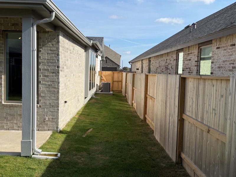 Exterior details and patio area of a home in Meridiana 40', 65', Iowa Colony (Image 3).